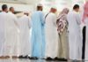 Preventing others from crossing during the prayer